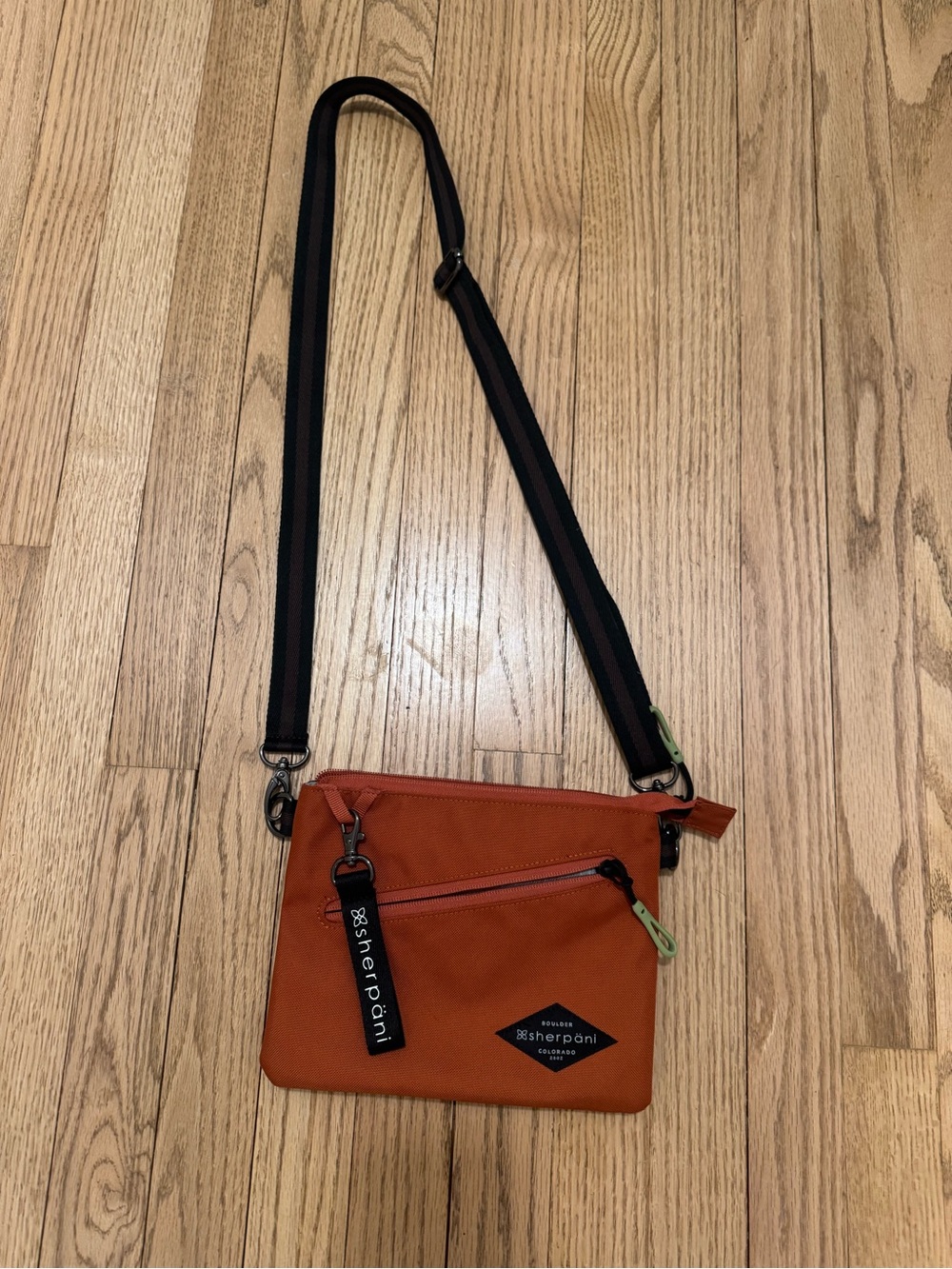Sherpani Orange Crossbody Messenger with Black Strap